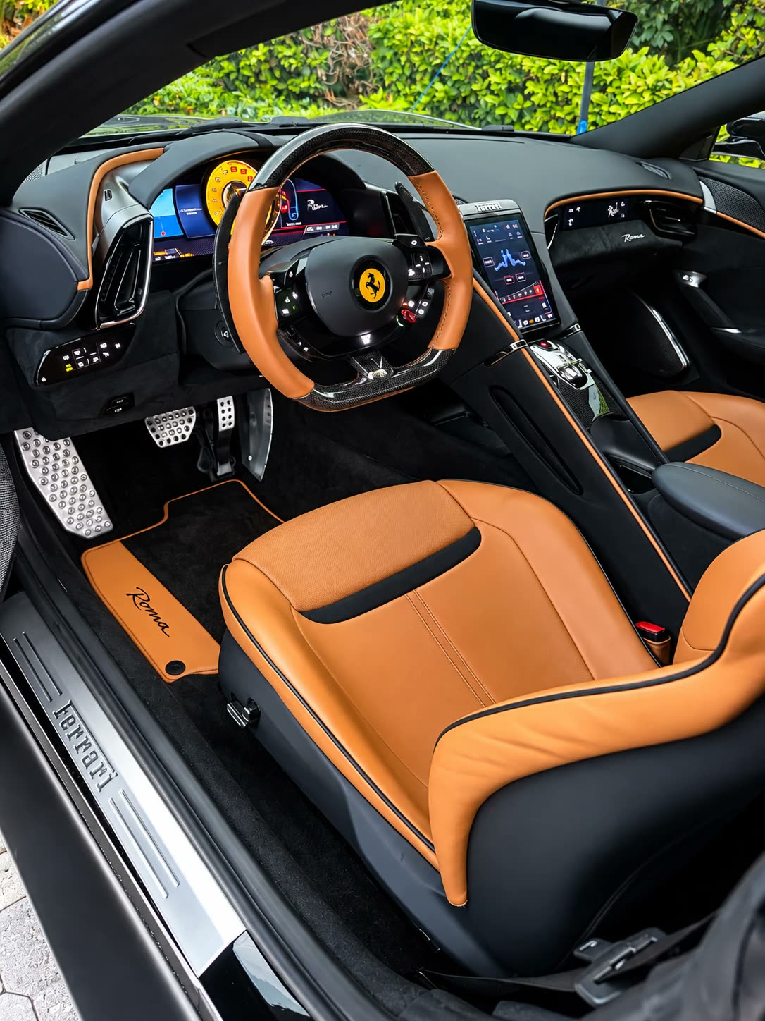 Spotless tan leather interior of a Ferrari Roma detailed by MDGA
